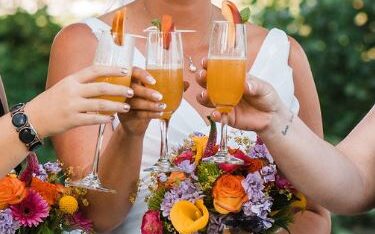 Drink image to say cheers and showcase peach belinis that the venue can make.