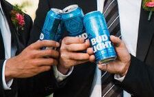 beers cheers photo of groomsmen for wedding at venue to show beverages